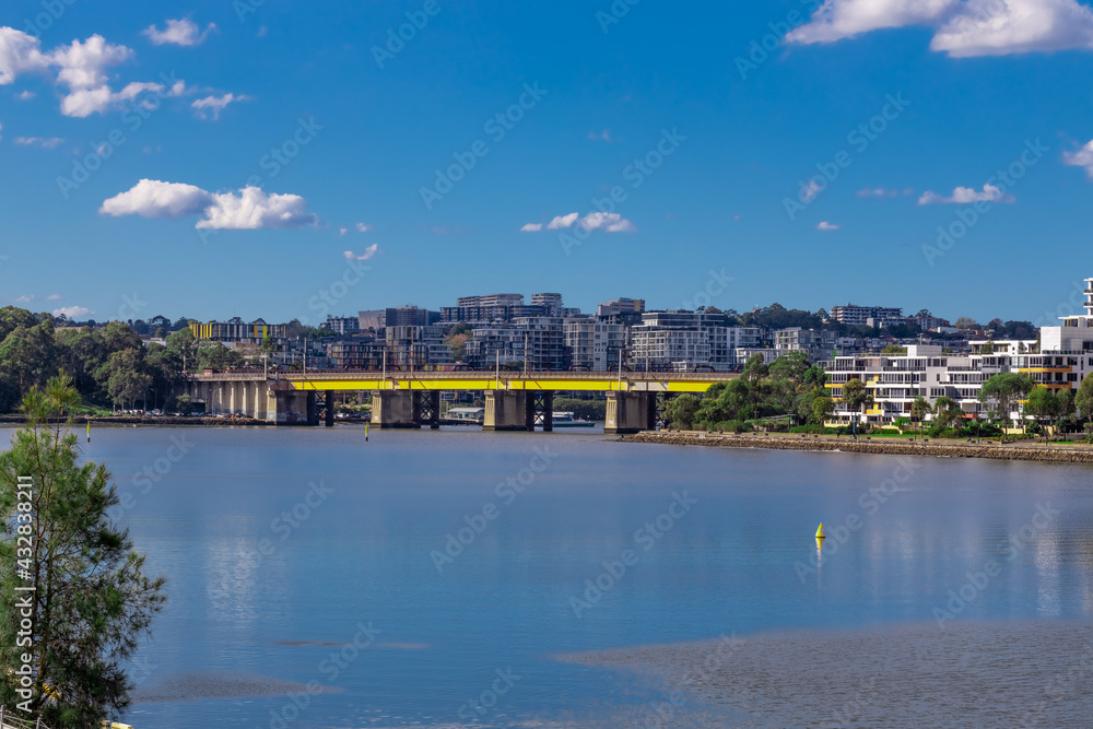 Rhodes bridge and apartment buildings on Parramatta river Sydney NSW Australia