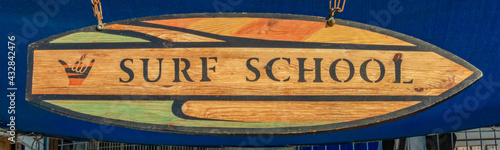 Photography Generic sign -surf school with surf board shape made of wood Eilat, Israel