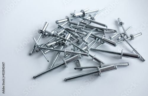 Silver aluminum rivets for metal on white isolate