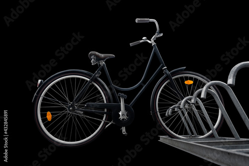 Low angle view of black traditional parked bike on dark background