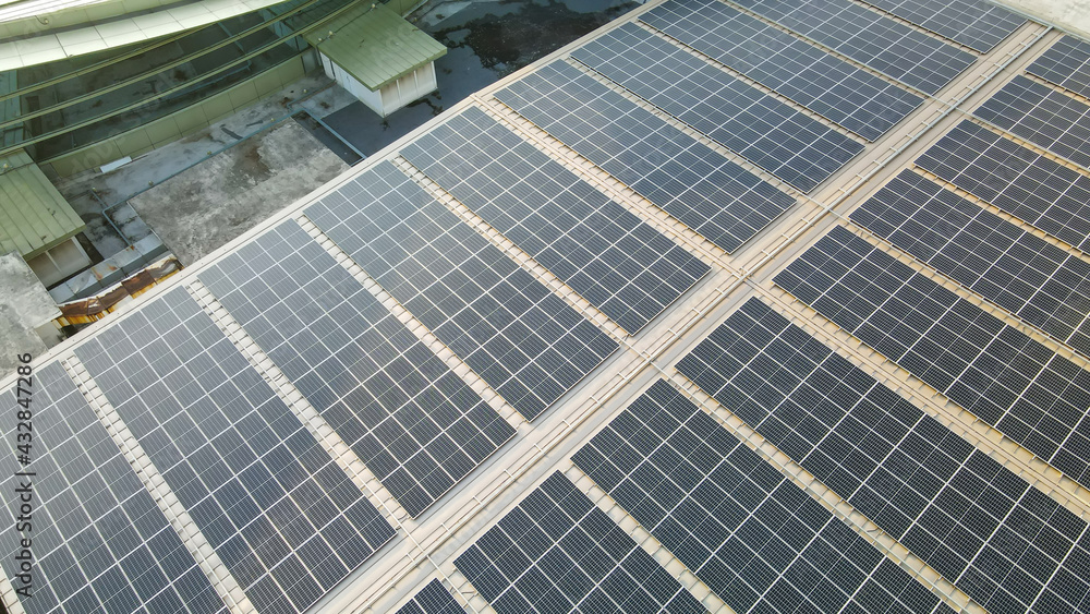 Aerial view of a solar panel on building roof top. Part of reduce reuse and restore, Renewable energy concept
Aerial view of a solar panel on building roof top. Part of reduce reuse and restore, Renewable energy concept