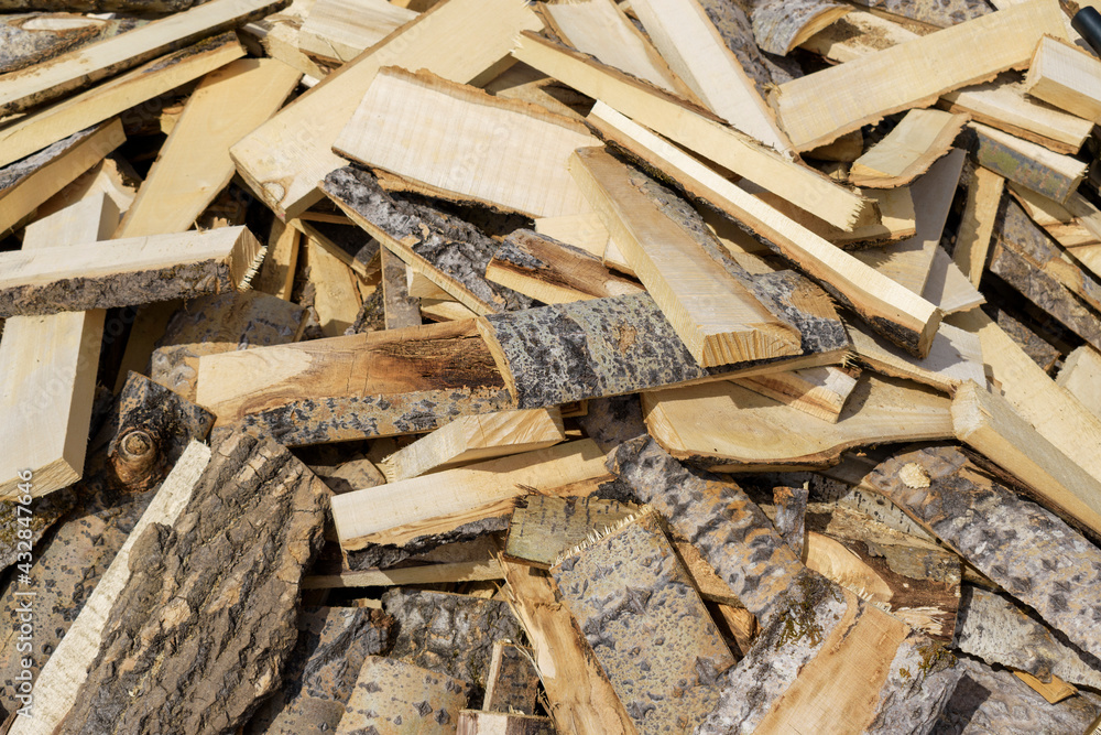A heap of firewood from aspen lumber. A heap of firewood from aspen lumber.