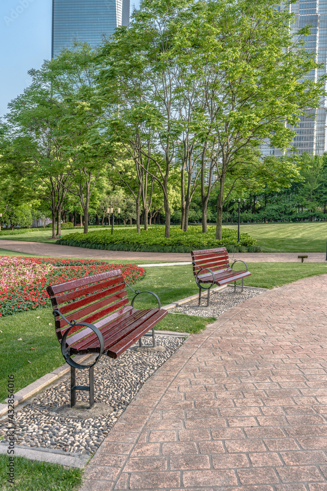 Fototapeta premium Lujiazui central park, green grass and modern skycrapers, for background.