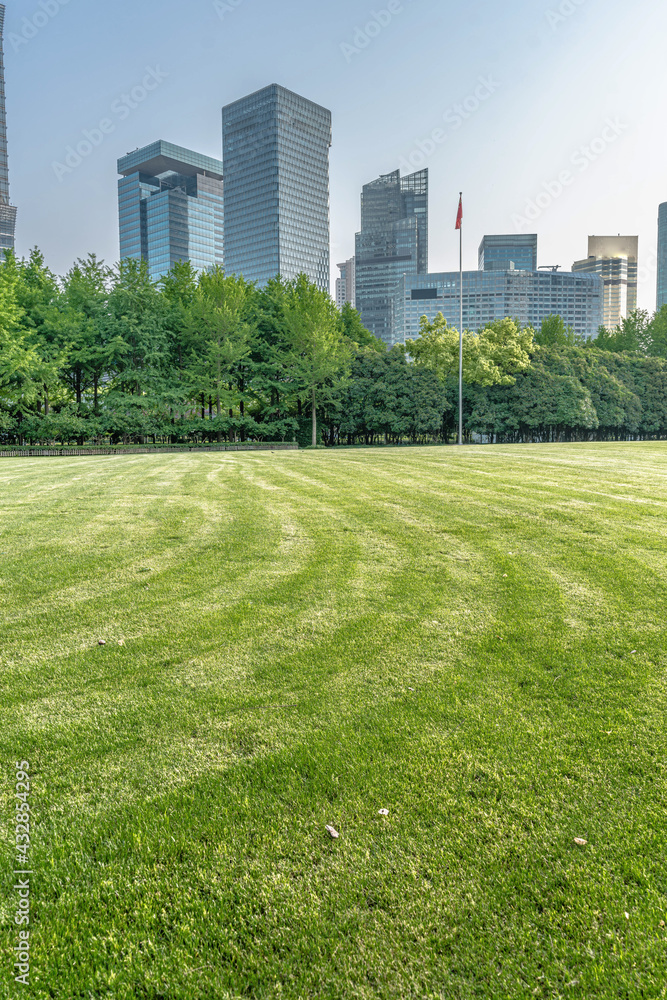 Lujiazui central park, green grass and modern skycrapers,  for background.