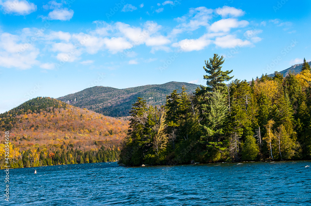 The Rivers, Lakes and Mountains of the New England States in Autumn Splendour.The Autumn colours are magnificent in New England.You can cruise on the lakes and marvel as the leaves turn red and gold

