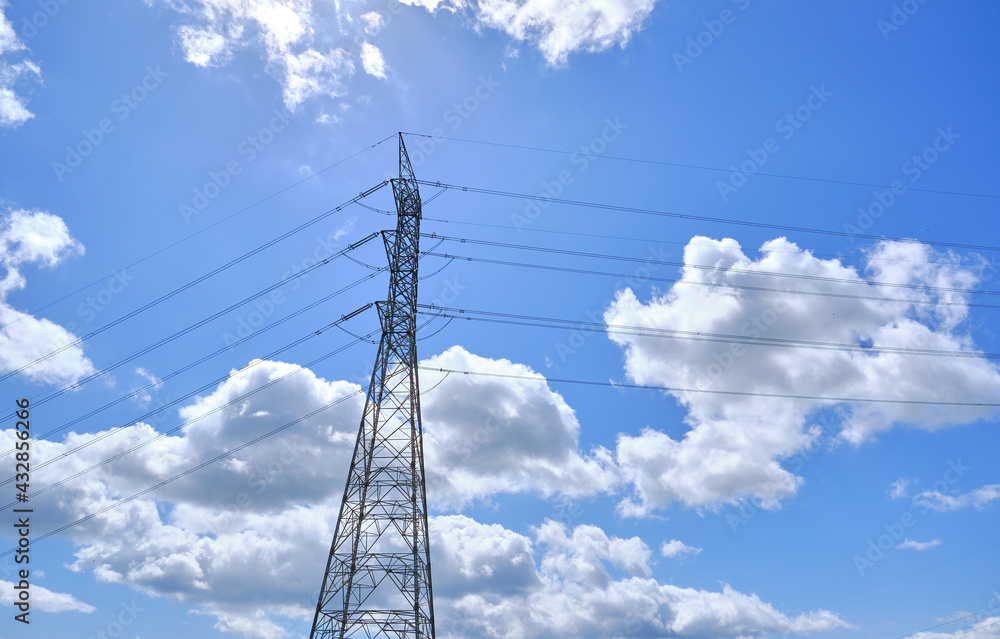 Power line support with cables for transmission of electricity. High voltage network tower with cable wire at the distribution station. energy industry, energy saving Power line support with cables for transmission of electricity. High voltage network tower with cable wire at the distribution station. energy industry, energy saving
