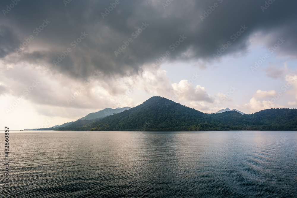 Sea and island with the rain cloud background