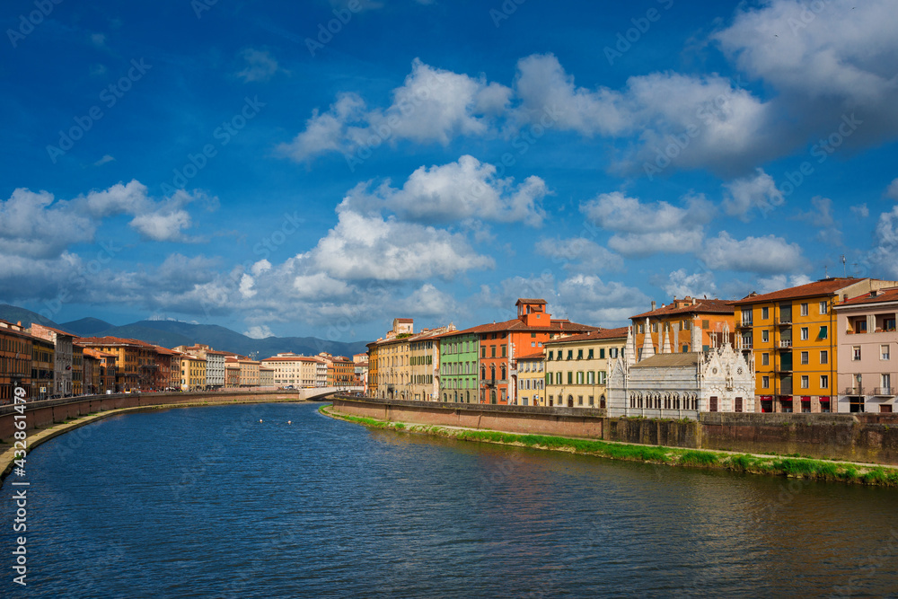 View of Pisa along River Arno with the characteristic gothic church of Santa Maria della Spina