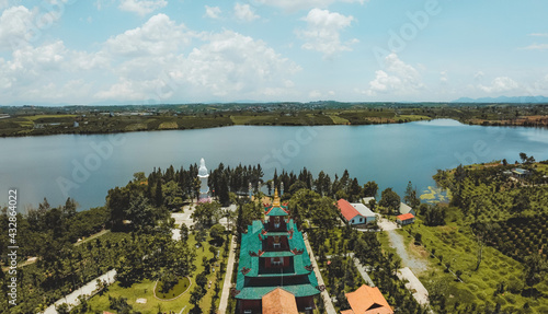 Aerial view of Hoa Nghiem Pagoda in Bao loc city, Lam Dong province, Vietnam. This pagoda is located on Bao Lam lake. photo