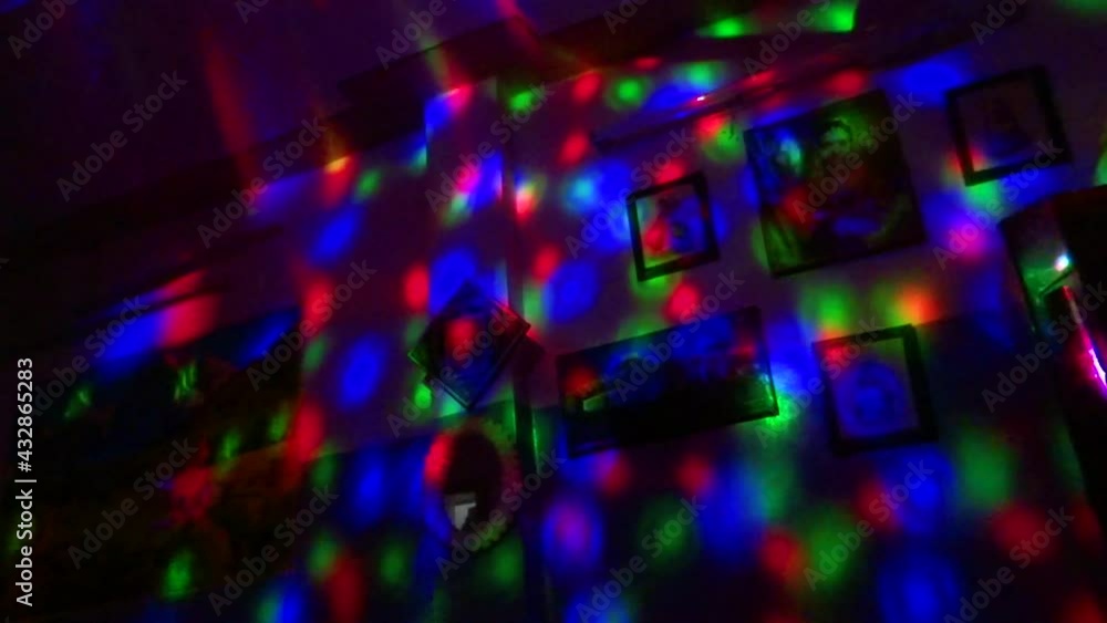 Colorful lights on room wall created by prism lamp Colorful lights on room wall created by prism lamp