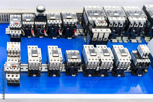 Foto Many and various contactors and magnetic switch and overload relay for control e