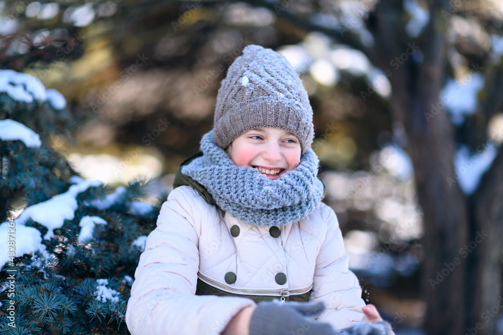 teen girl posing in winter forest, playing with snow teen girl posing in winter forest, playing with snow