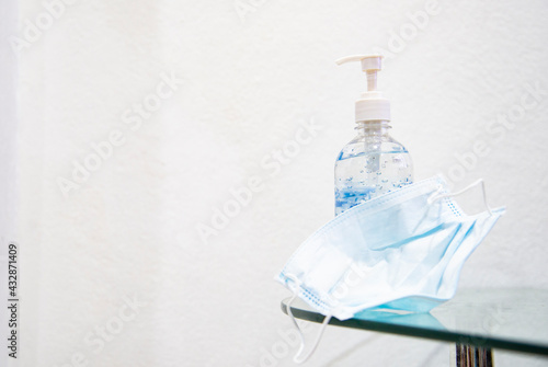 Hand sanitizer alcohol gel Antivirus protection and medical surgical masks with standard to prevent coronavirus COVID-19 infection.Healthcare and medical concept.