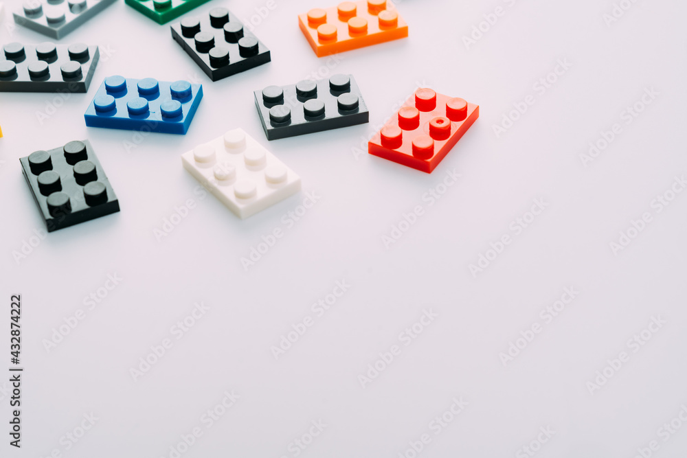 Plastic building blocks on white background Plastic building blocks on white background
