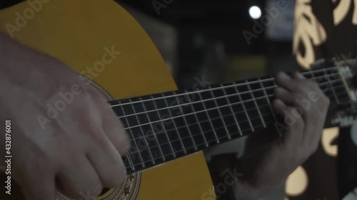 Person playing guitar