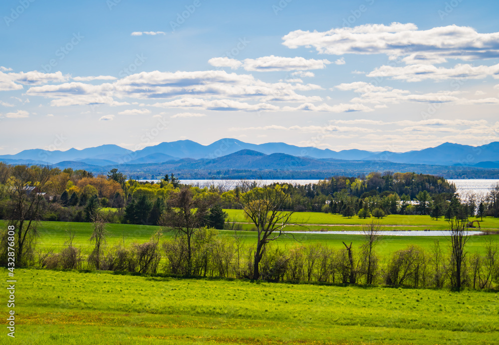 spring time view of Lake Champlain in Vermont and the Adirondack Mountains in New York
