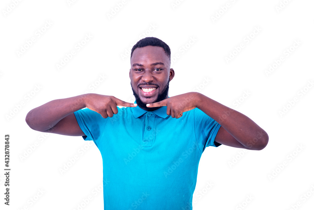 handsome happy young man pointing fingers. handsome happy young man pointing fingers.