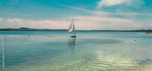 Fotografija Boat in the blue sea