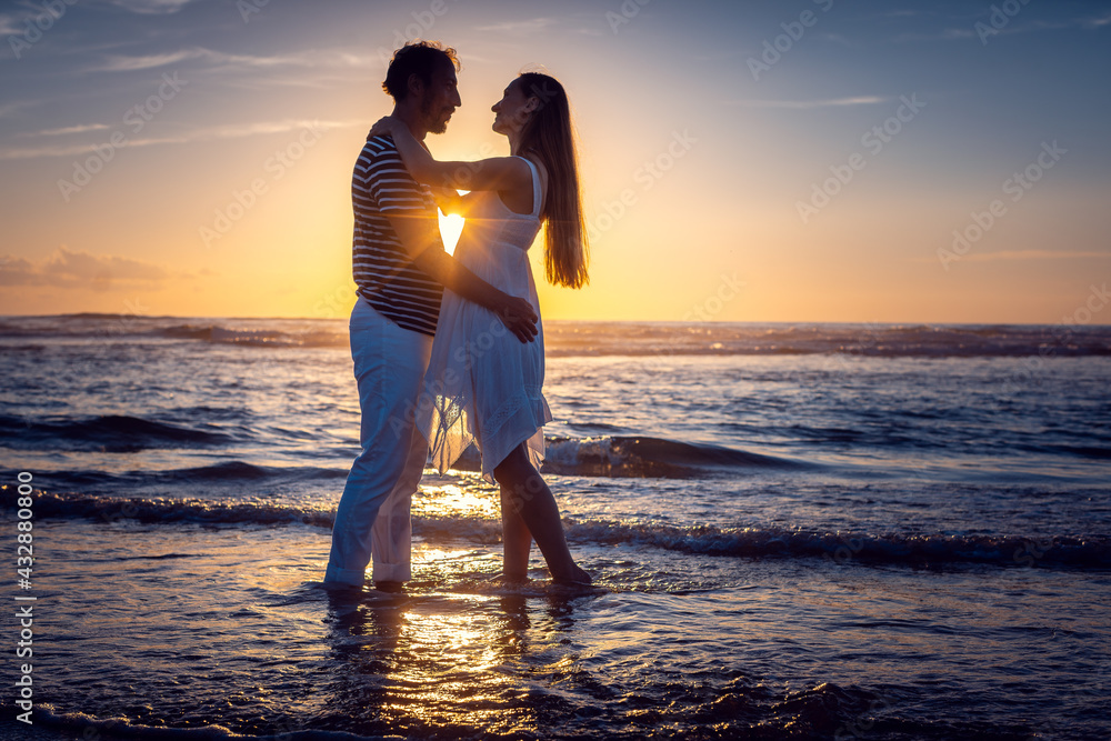 Romantic couple in love kissing on the beach during sunset Stock Photo | Adobe Stock Romantic Couple In Love Kissing On The Beach During Sunset Stock Photo | Adobe Stock