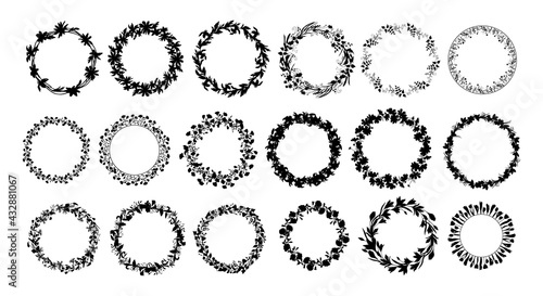 Set of vector wreaths in black ink on a white background. Flowers and herbs are hand-drawn. Natural plants from leaves, roses, lilies. Botany and flora. Round design for medicine, postcards, cosmetics