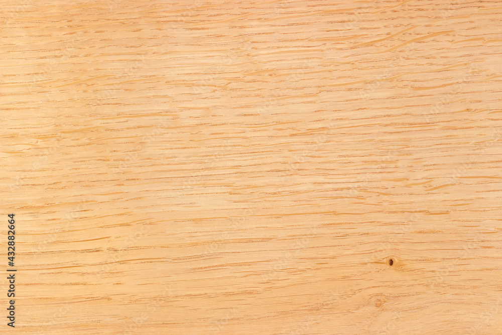 Naklejka premium Background of the light colored oak plank, close-up