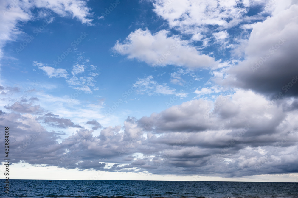 Cloudy on blue sky over the sea Cloudy on blue sky over the sea