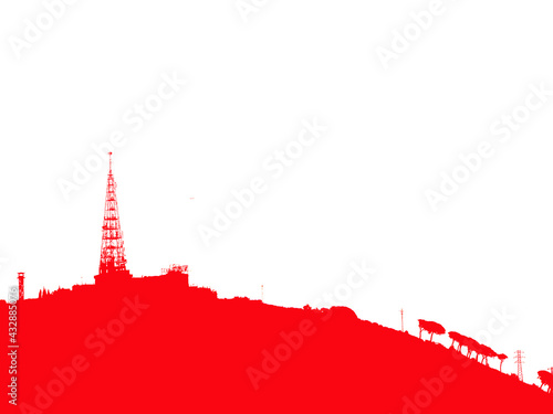 Silhouette on the mountain of an analog radio antenna