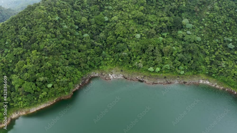 Lush Vegetation On Mountains At Lake Danao In Ormoc, Leyte, Philippines. - Aerial Panning Shot Lush Vegetation On Mountains At Lake Danao In Ormoc, Leyte, Philippines. - Aerial Panning Shot