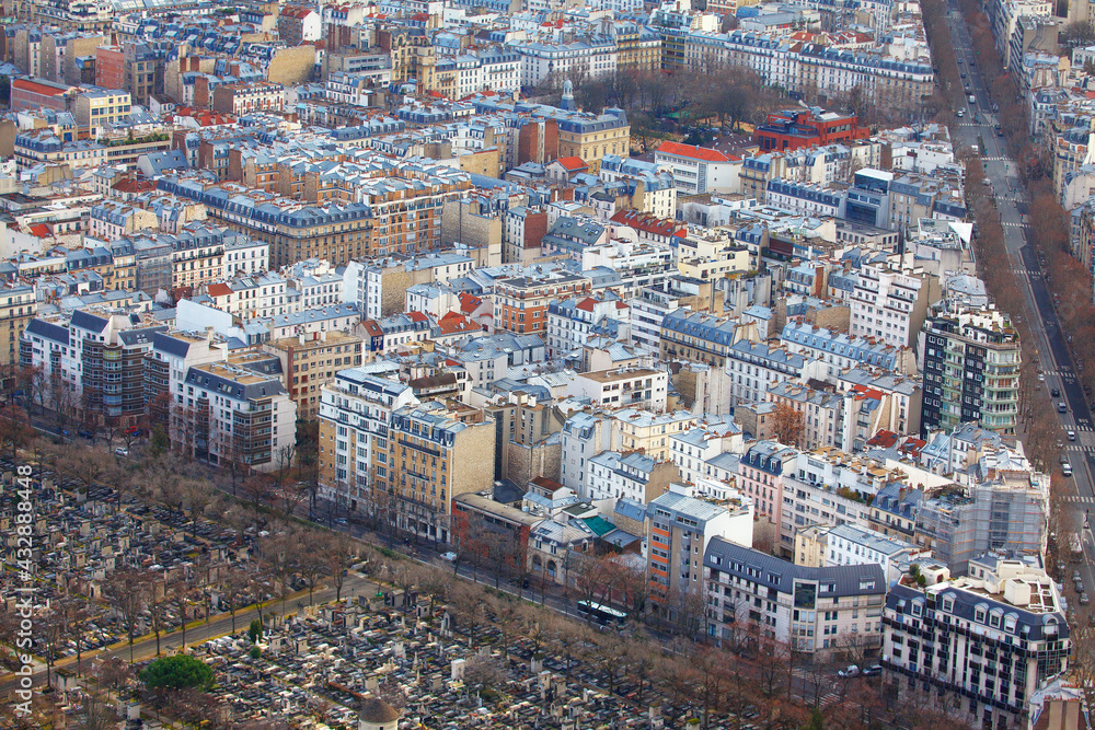 Aerial panorama of Paris streets and houses . Montparnasse Cemetery .  Aerial view of 14th arrondissement of Paris - obrazy, fototapety, plakaty 