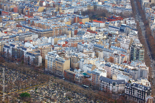 Aerial panorama of Paris streets and houses . Montparnasse Cemetery .  Aerial view of 14th arrondissement of Paris