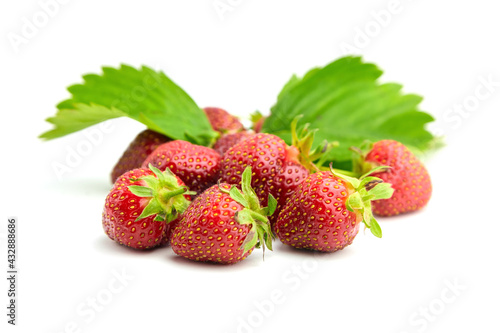 Strawberry red berries with green leaves isolated on white background