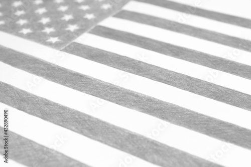 USA flag, hand-drawn with a pencil. Black and white patriotic background, wallpaper or backdrop. Handmade Stars and Stripes. American Independence Day. The holidays of July 4 and Flag Day
