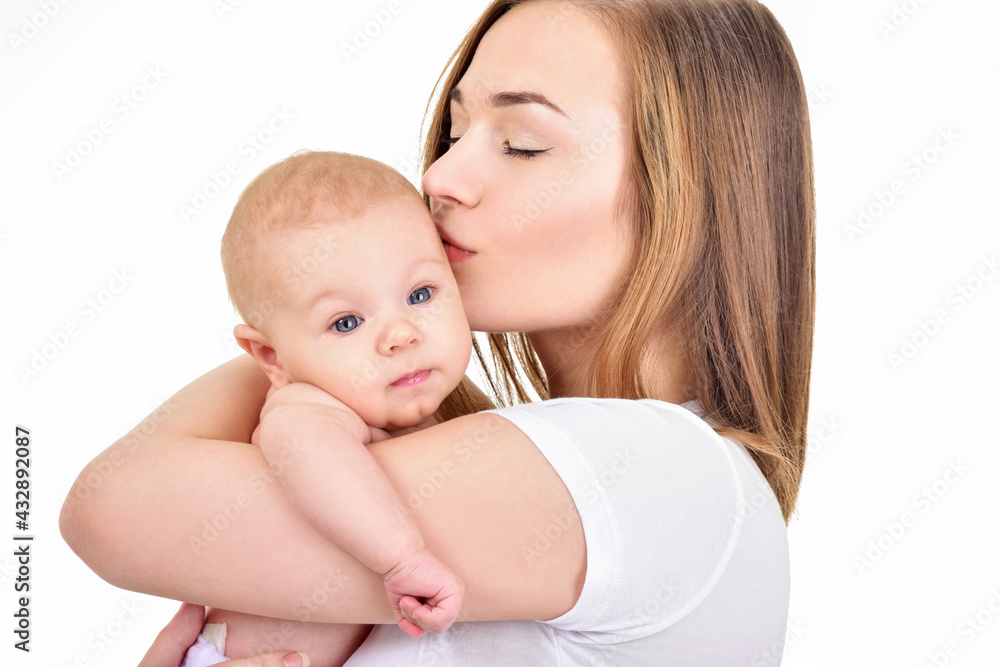 Mother and baby playing and smiling. Happy family. Mother and baby playing and smiling. Happy family.