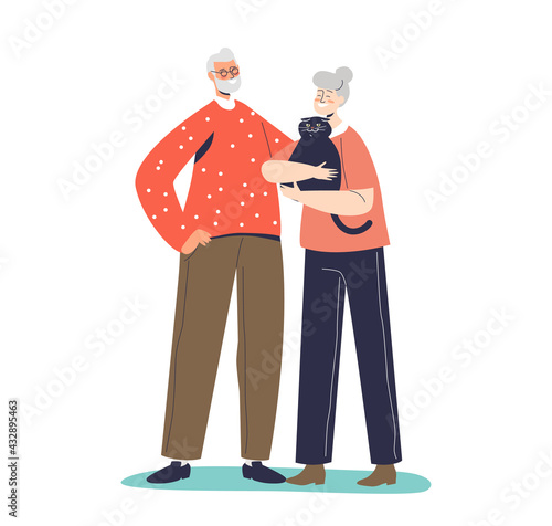 Cute senior couple holding cat. Elder man and woman, married grandparents with black kitten in hands