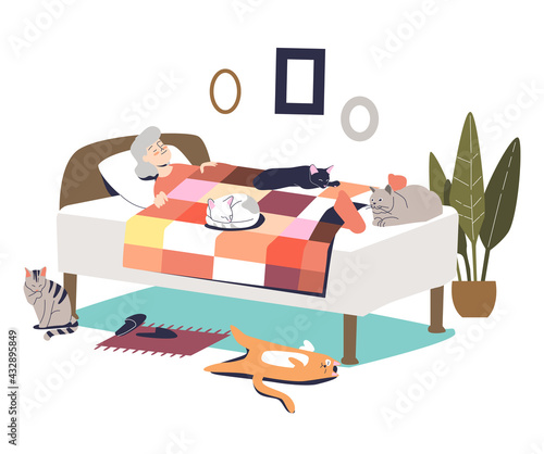 Senior woman sleeping in bed and cats around. Cute elder grandmother lady has rest in bedroom