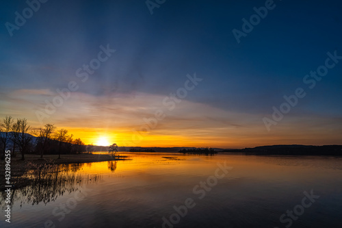 Stunning sunset along the wooden bridge on the shores of the Upper Zurich Lake  Obersee  between Hurden and Rapperswil  Switzerland