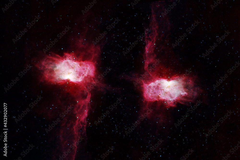 Two galaxies on a dark background. Elements of this image were furnished by NASA.