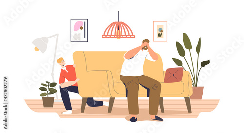 Boy hiding at sofa and father count play hide and seek game at home . Leisure funny indoor activity