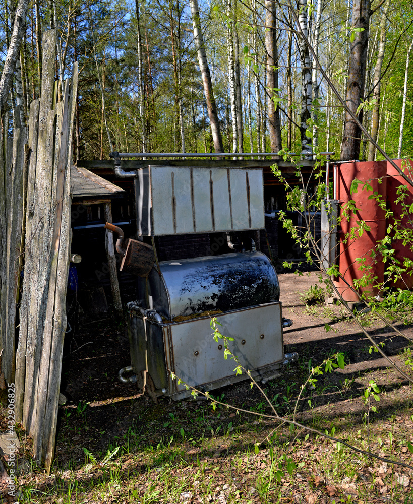 General view of self-made equipment for the preparation of various distillates. They are commonly made in Podlasie in Poland. The exhibition can be seen in the Podlasie village museum. General view of self-made equipment for the preparation of various distillates. They are commonly made in Podlasie in Poland. The exhibition can be seen in the Podlasie village museum.