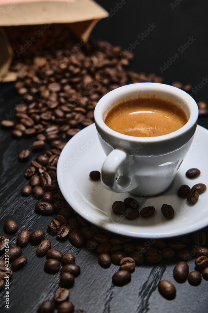 coffee beans around cup of coffee coffee beans around cup of coffee