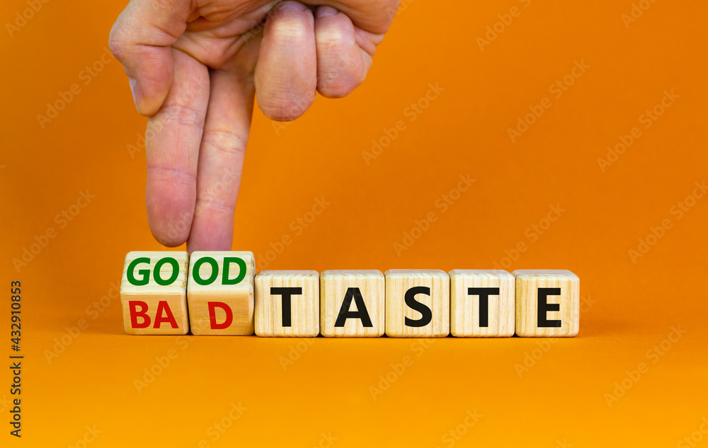 Good or bad taste symbol. Businessman turns wooden cubes and changes