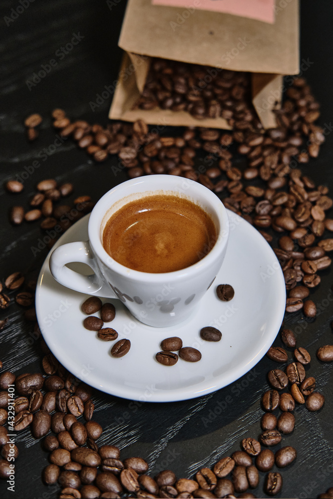 fresh cup of espresso coffee on black table fresh cup of espresso coffee on black table