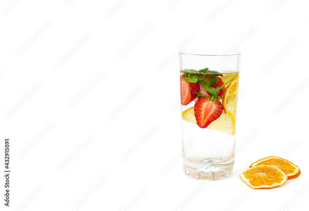 © ds17 - Water with strawberries and lemon in a transparent glass on a white isolated background © ds17 - Water with strawberries and lemon in a transparent glass on a white isolated background