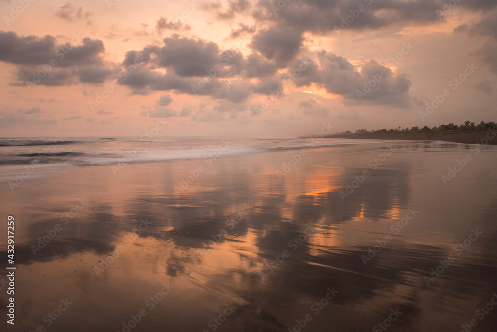 Sunset on the beaches of Pandagaran in Java, Indonesia