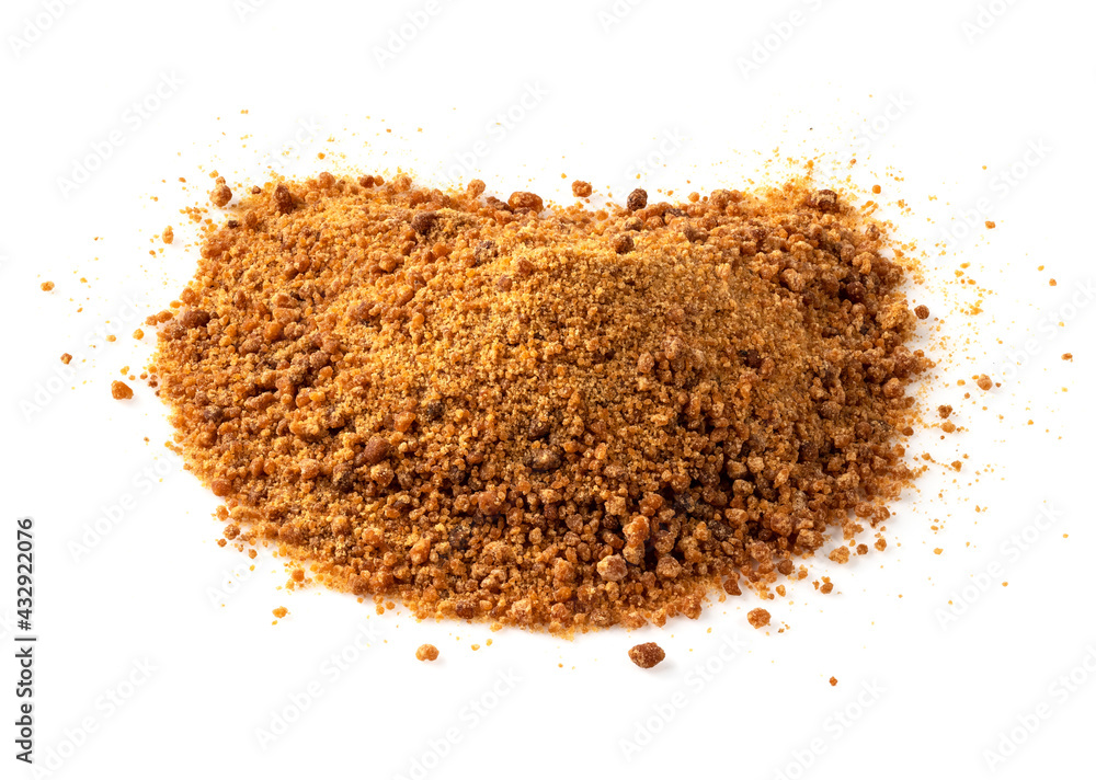 pile of granulated coconut blossom sugar on white pile of granulated coconut blossom sugar on white