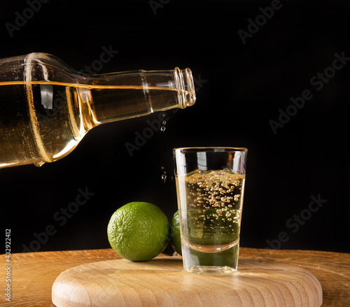 Brazilian drink known as Cachaça, drink from sugar cane. It is used in the preparation of the caipirinha known worldwide, selective focus. photo