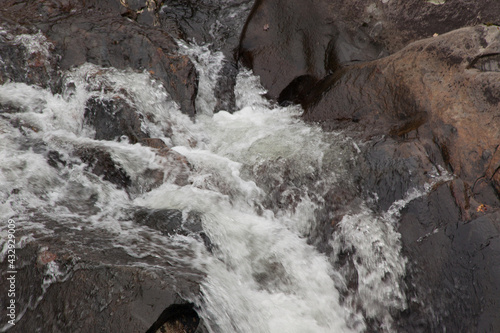 Stream cascading by rocks