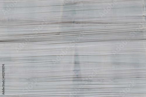 white shrink wrap film with horizontal folds - full frame background and flat texture