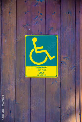 Green yellow disabled sign photo