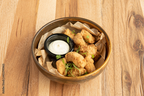 nice wooden bowl with pieces of marinated dogfish